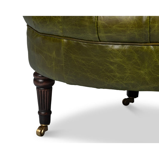 Chaise à dossier tonneau en cuir vert