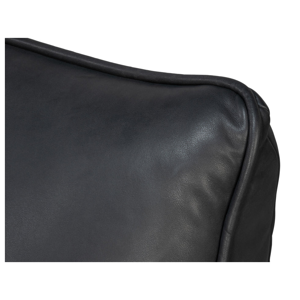 Fauteuil chausson pivotant en cuir noir