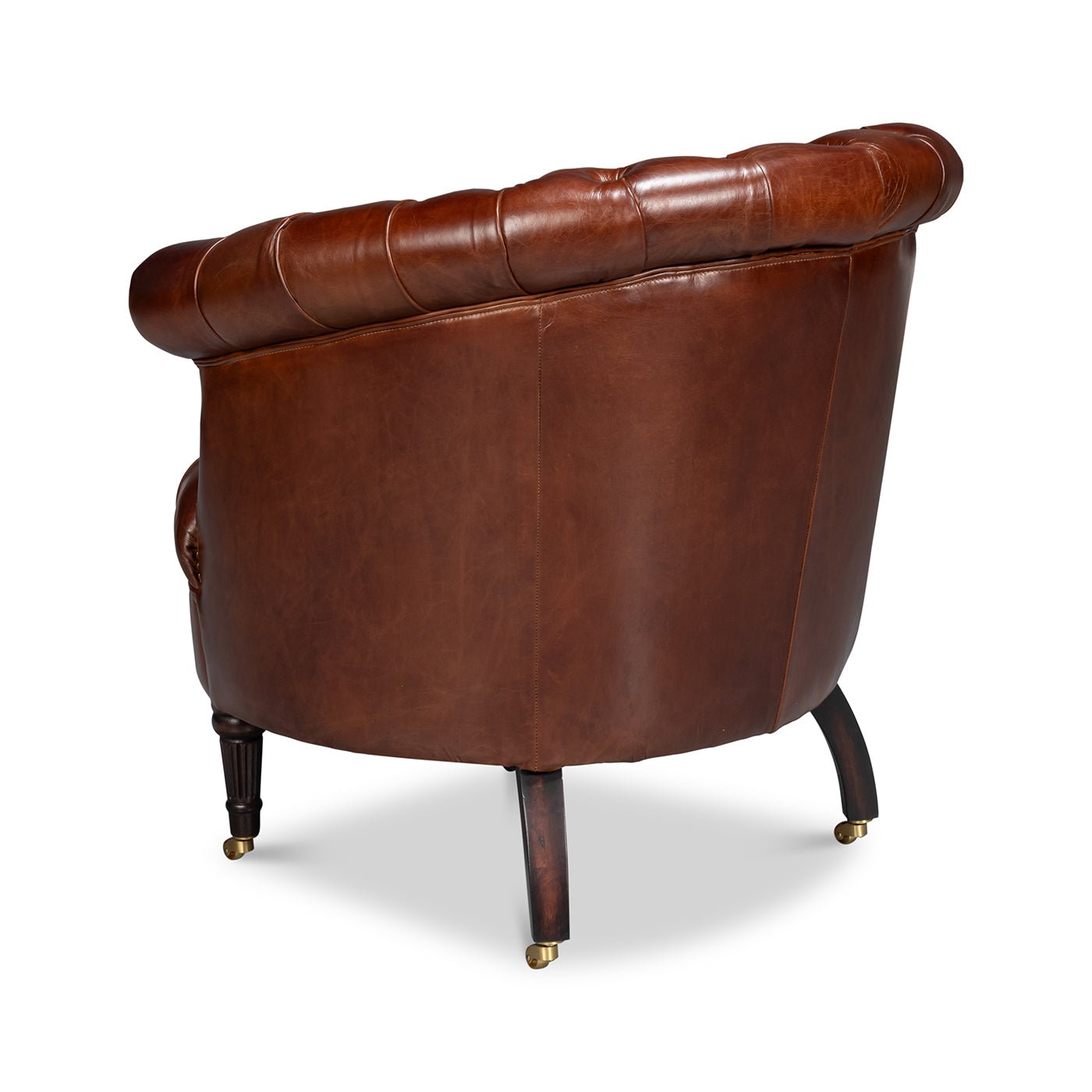 Chaise à dossier tonneau en cuir marron