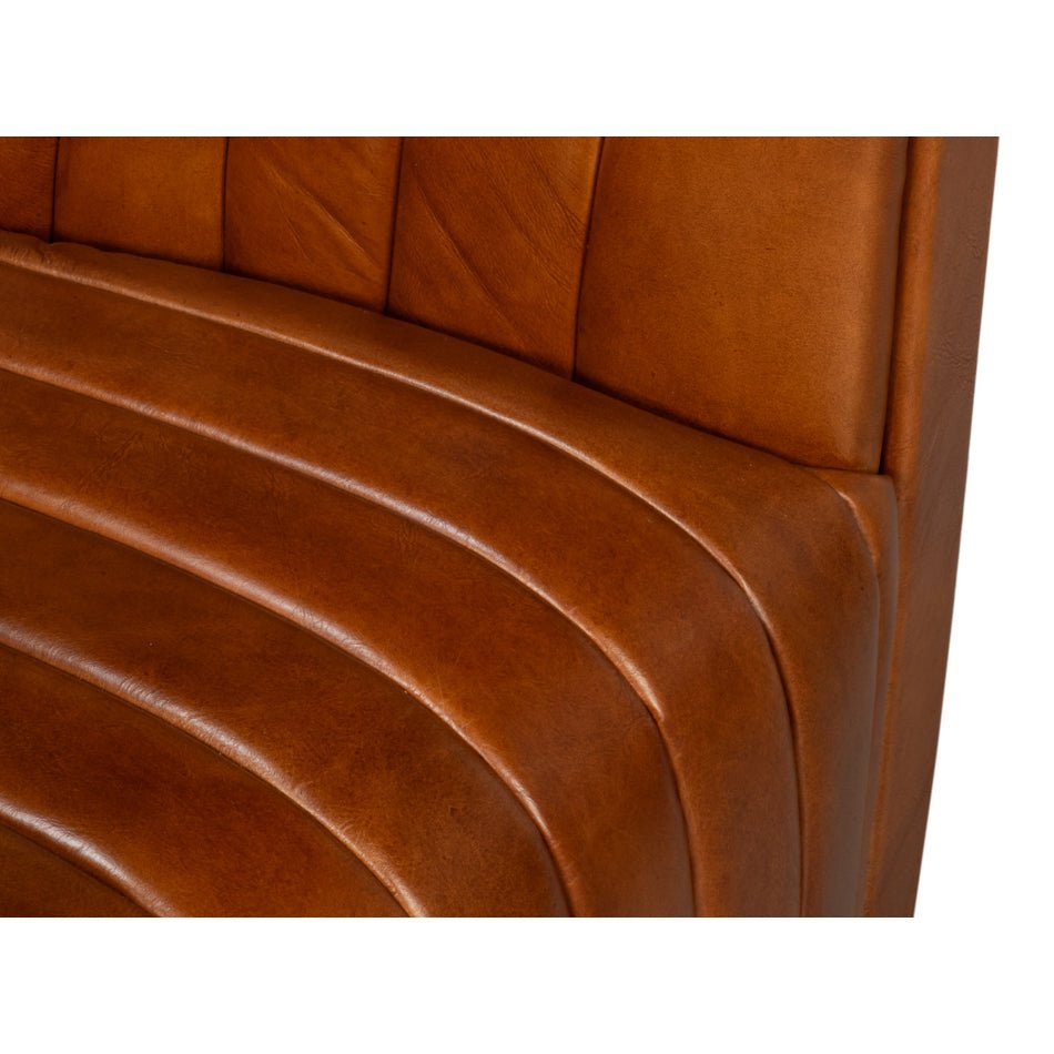 Chaise pivotante capitonnée en cuir marron