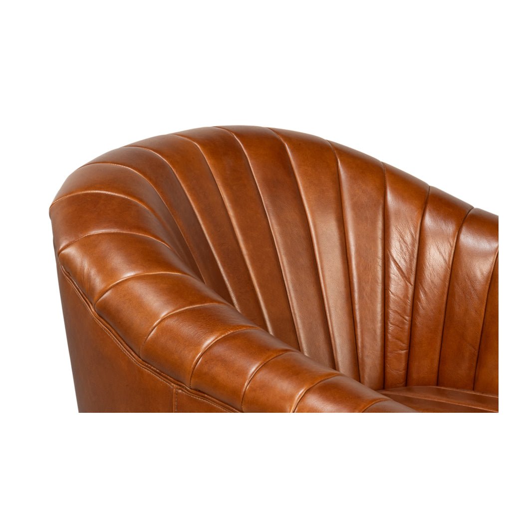 Chaise pivotante capitonnée en cuir marron