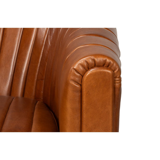 Chaise pivotante capitonnée en cuir marron