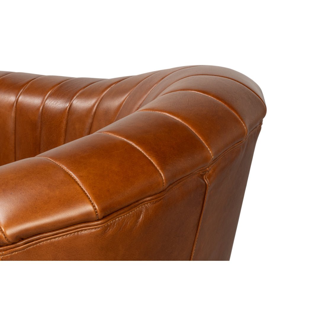 Chaise pivotante capitonnée en cuir marron