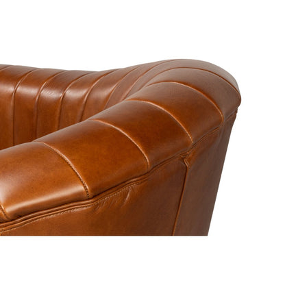 Chaise pivotante capitonnée en cuir marron