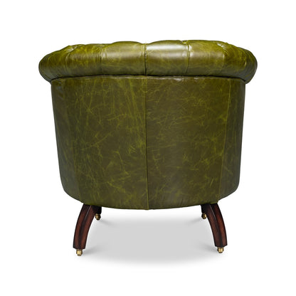 Chaise à dossier tonneau en cuir vert