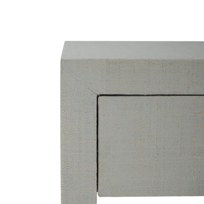 Table de chevet enveloppée de raphia bleu pâle