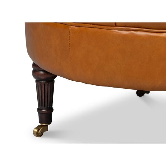 Chaise à dossier tonneau en cuir de selle beige