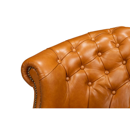 Chaise à dossier tonneau en cuir de selle beige