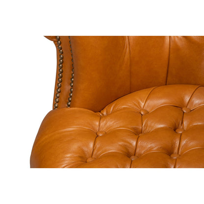 Chaise à dossier tonneau en cuir de selle beige