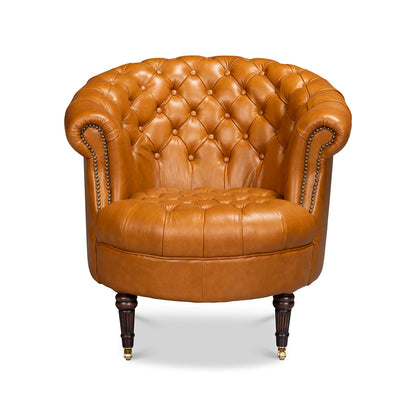 Chaise à dossier tonneau en cuir de selle beige