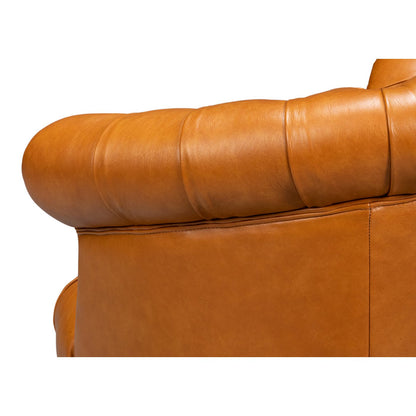 Chaise à dossier tonneau en cuir de selle beige